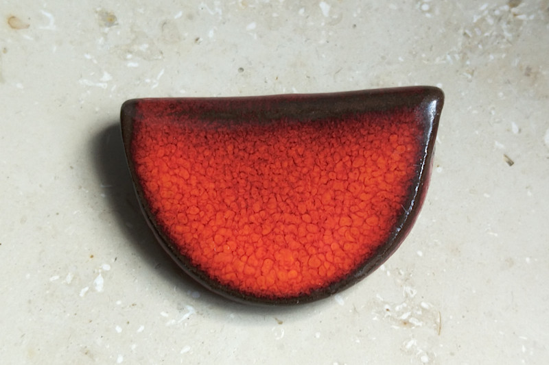 Keramikkette kräftiges orange / rot halbrund
